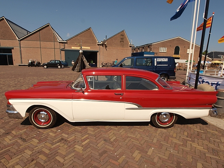 Red and white Ford 300 Custom (