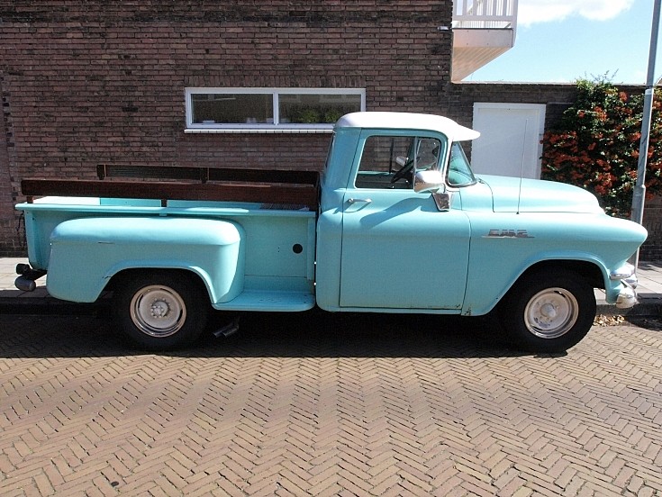 Side view of blue pick up