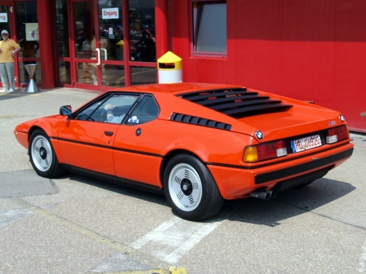 BMW M1 1979 Orange BMW M1 midengined sports car participating in the 