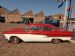 Red and white Ford 300 Custom (