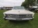 White coloured Chrysler Imperial of the mid-60s