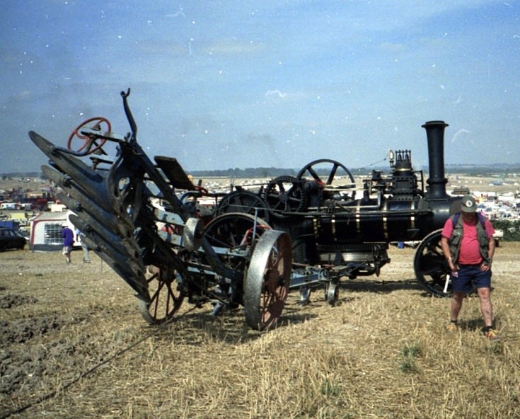 Ploughing engine and plough